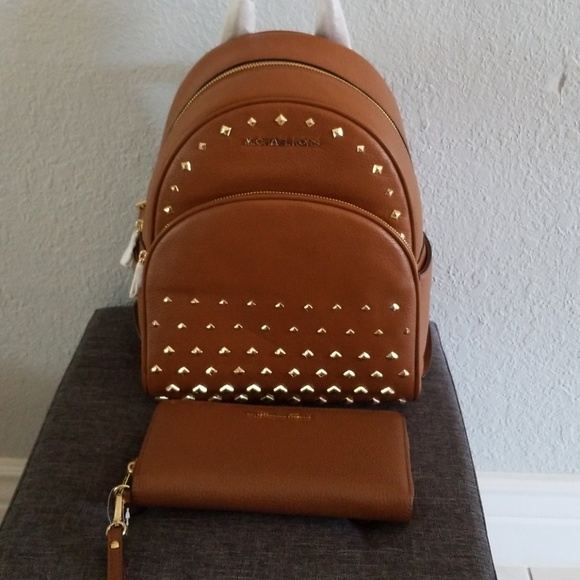 Handbags - Michael Kors backpack and matching wallet clutch